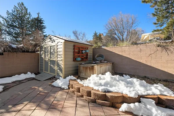 a view of a terrace with chair and tables