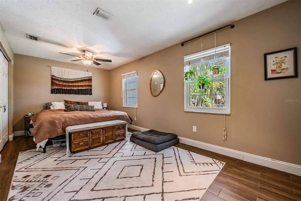 611 St Henry Drive Brandon, FL 33511 - Photo 14 of 34 a bedroom with a bed dresser and a window