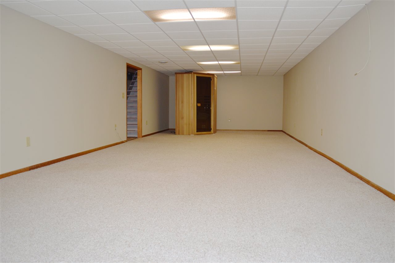 5642 Gray Eagle Road Roscoe, IL 61073 - Photo 11 of 15 a view of an empty room with a window