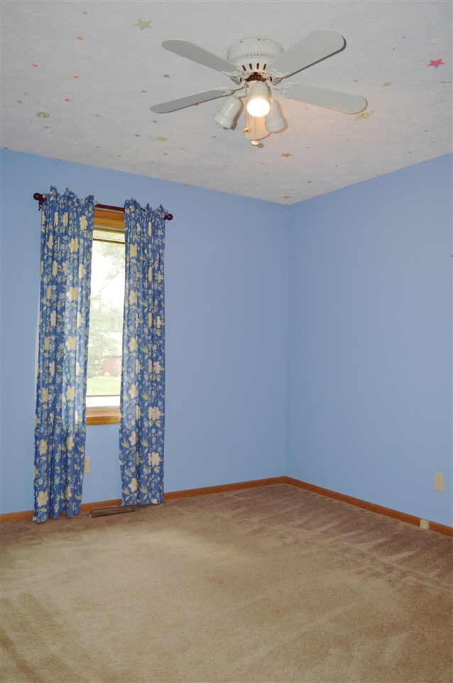5642 Gray Eagle Road Roscoe, IL 61073 - Photo 9 of 15 a view of an empty room with a window