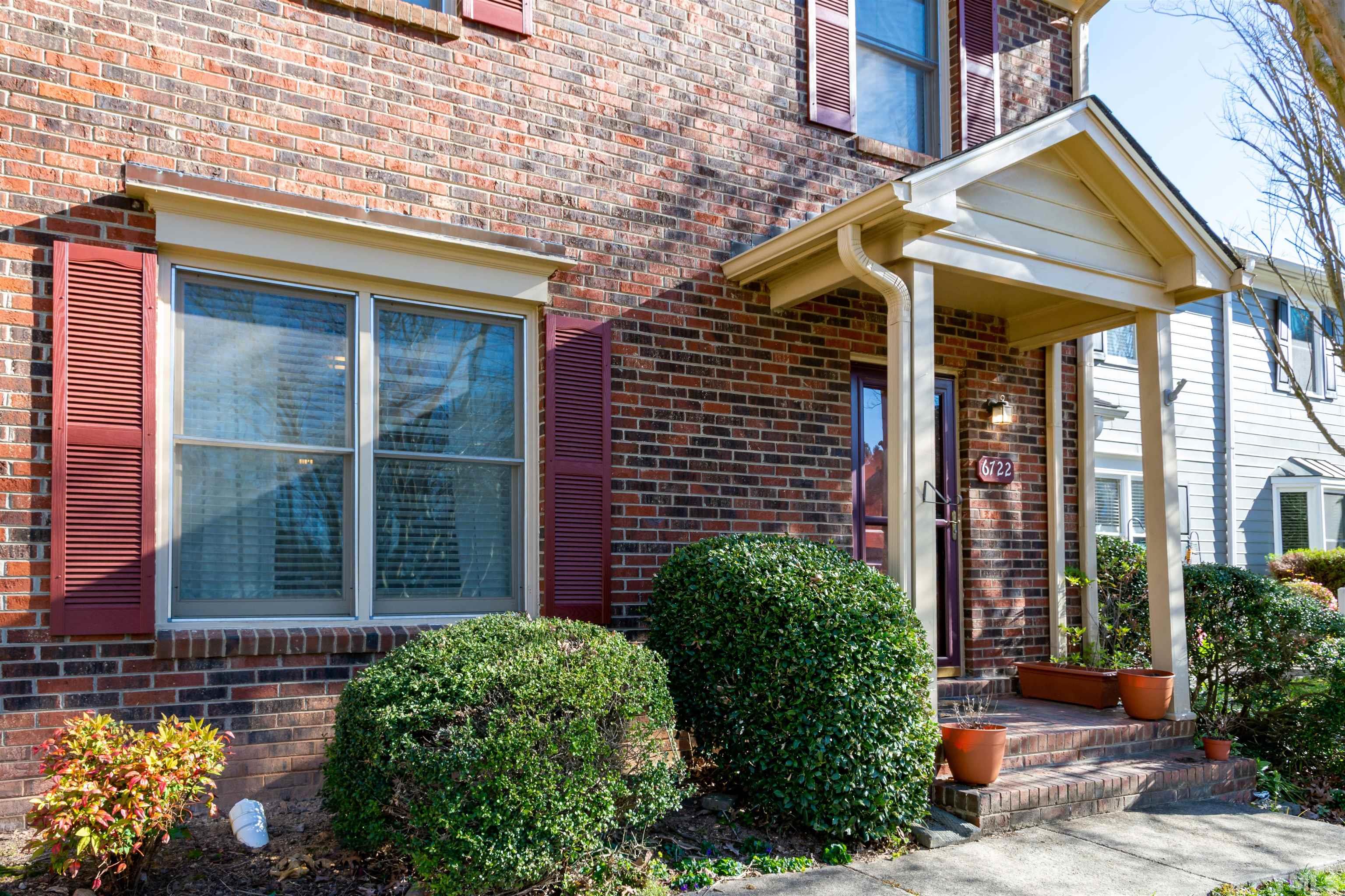 6722 Twin Tree Court Raleigh, NC 27613 - Photo 2 of 33 a view of a house with potted plants