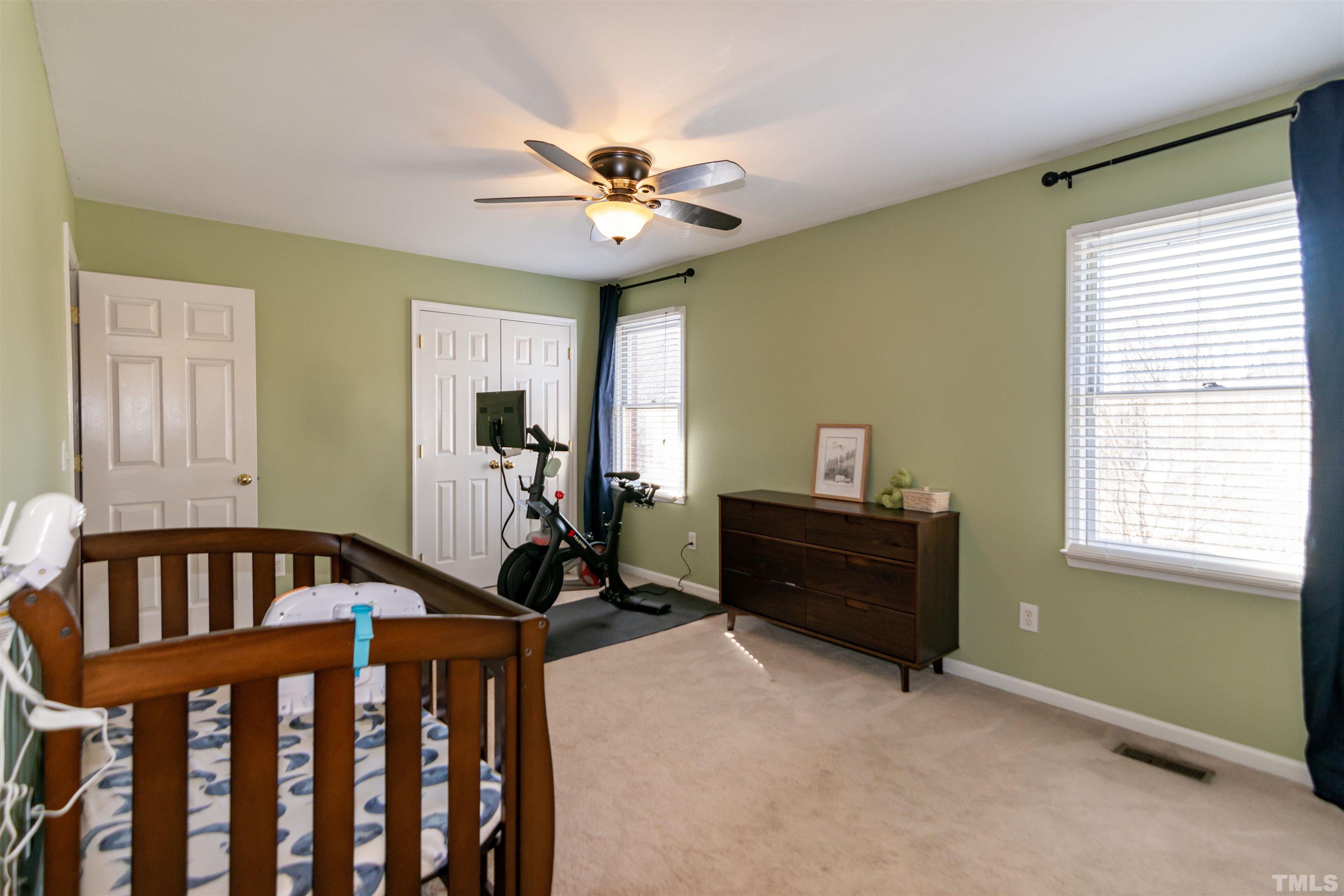 6722 Twin Tree Court Raleigh, NC 27613 - Photo 26 of 33 a bedroom with furniture and a window