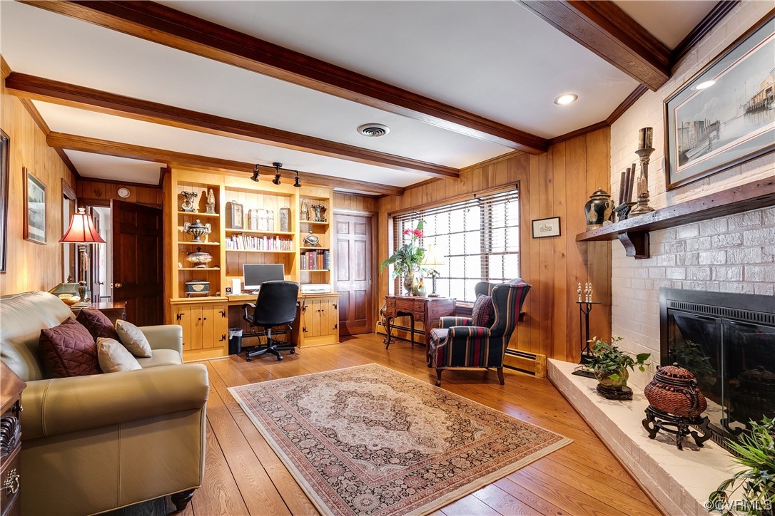 1430 Bloomfield Road Richmond, VA 23225 - Photo 19 of 47 a living room with furniture fireplace and a table