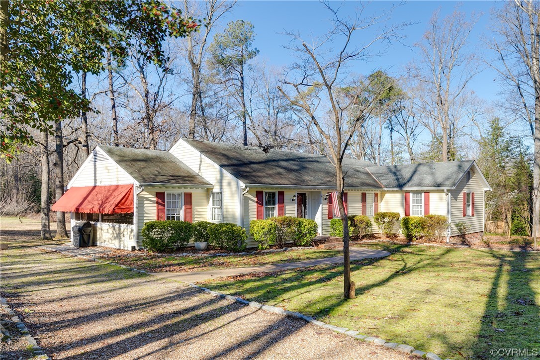 1430 Bloomfield Road Richmond, VA 23225 - Photo 2 of 47 a view of a building with a yard