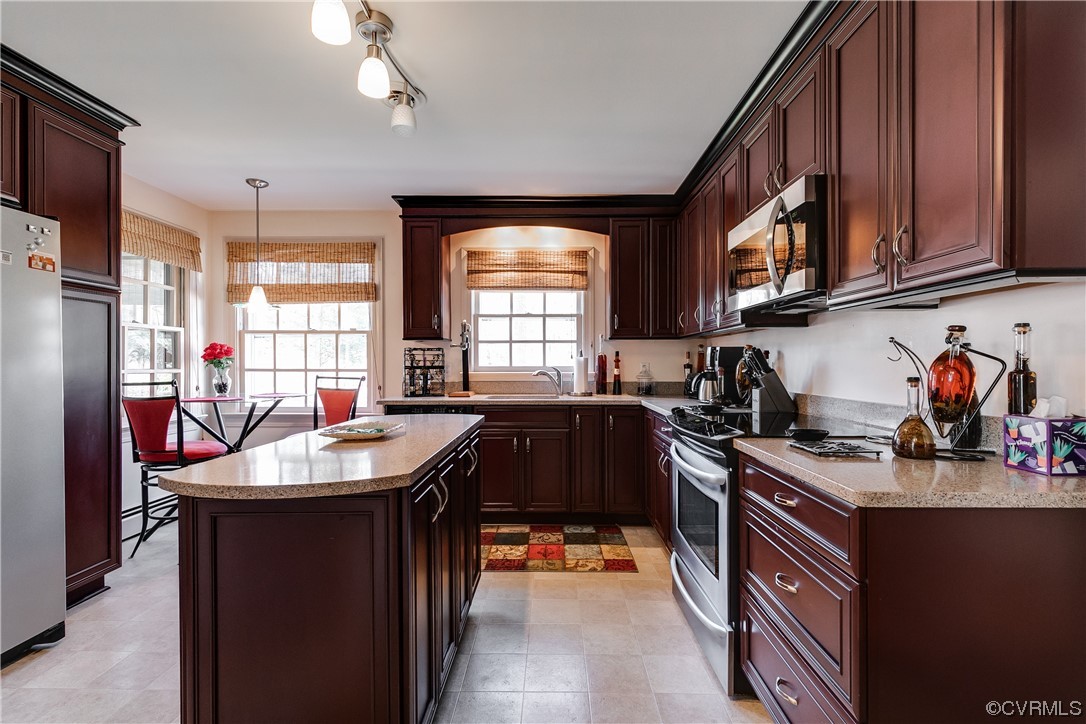 1430 Bloomfield Road Richmond, VA 23225 - Photo 22 of 47 a kitchen with granite countertop a sink stove and cabinets