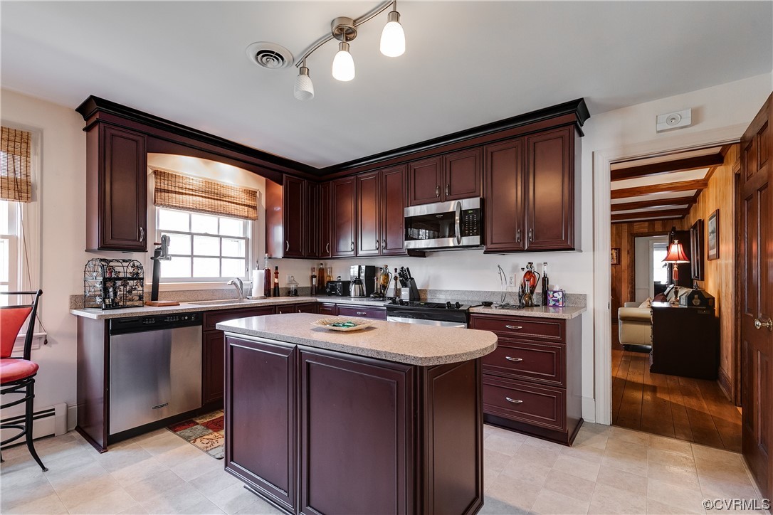 1430 Bloomfield Road Richmond, VA 23225 - Photo 28 of 47 a kitchen with stainless steel appliances granite countertop a sink dishwasher stove top oven and refrigerator