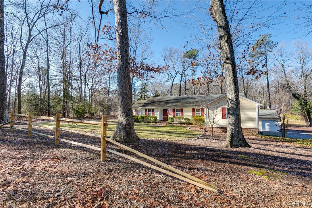1430 Bloomfield Road Richmond, VA 23225 - Photo 3 of 47 a view of a yard in the forest