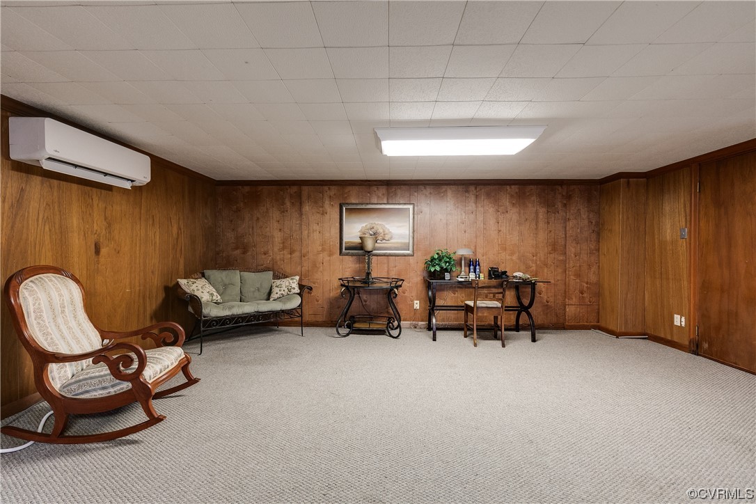 1430 Bloomfield Road Richmond, VA 23225 - Photo 33 of 47 a living room with furniture and a chair