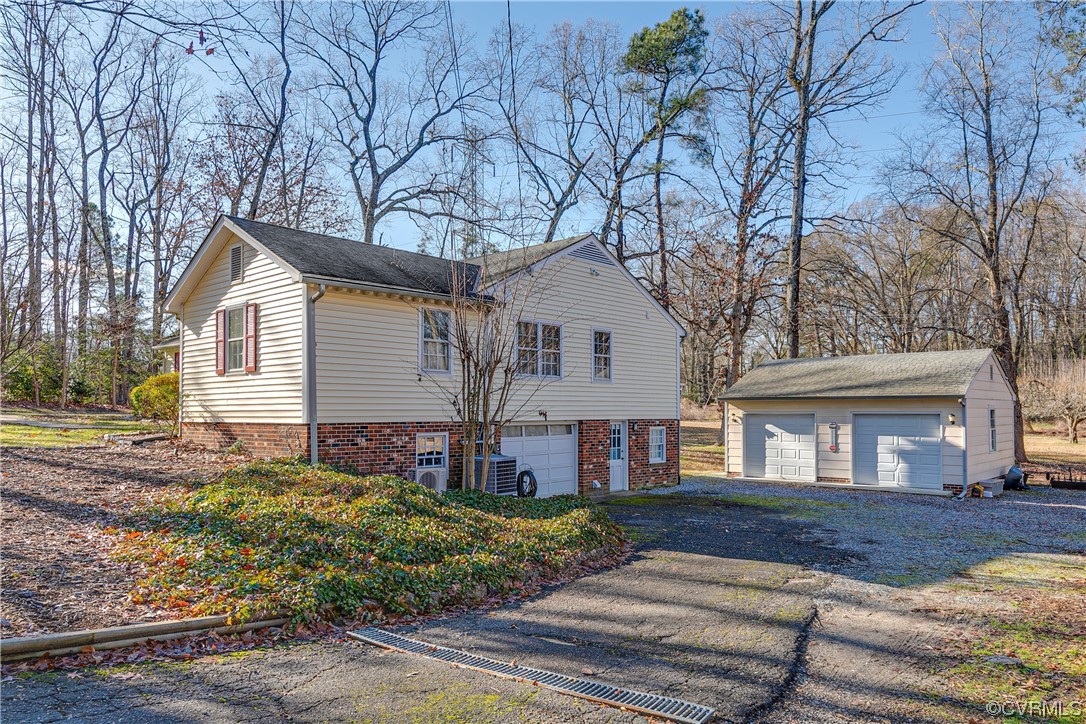 1430 Bloomfield Road Richmond, VA 23225 - Photo 4 of 47 a front view of a house with a yard