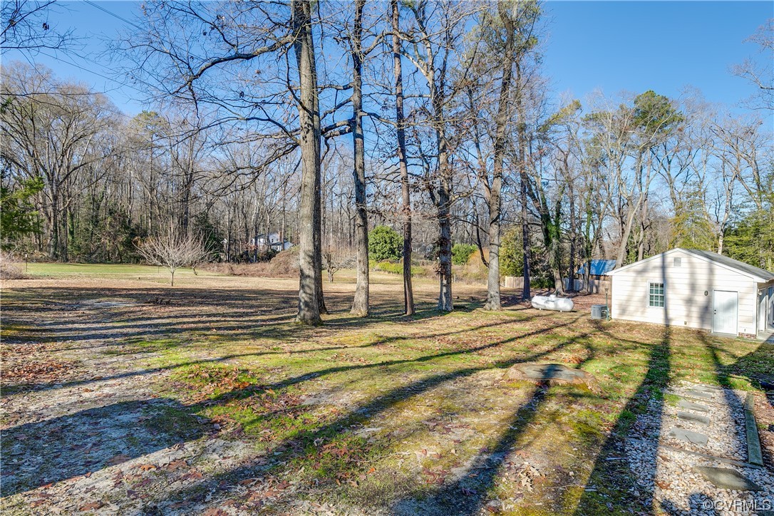 1430 Bloomfield Road Richmond, VA 23225 - Photo 43 of 47 a view of yard with tree in the background