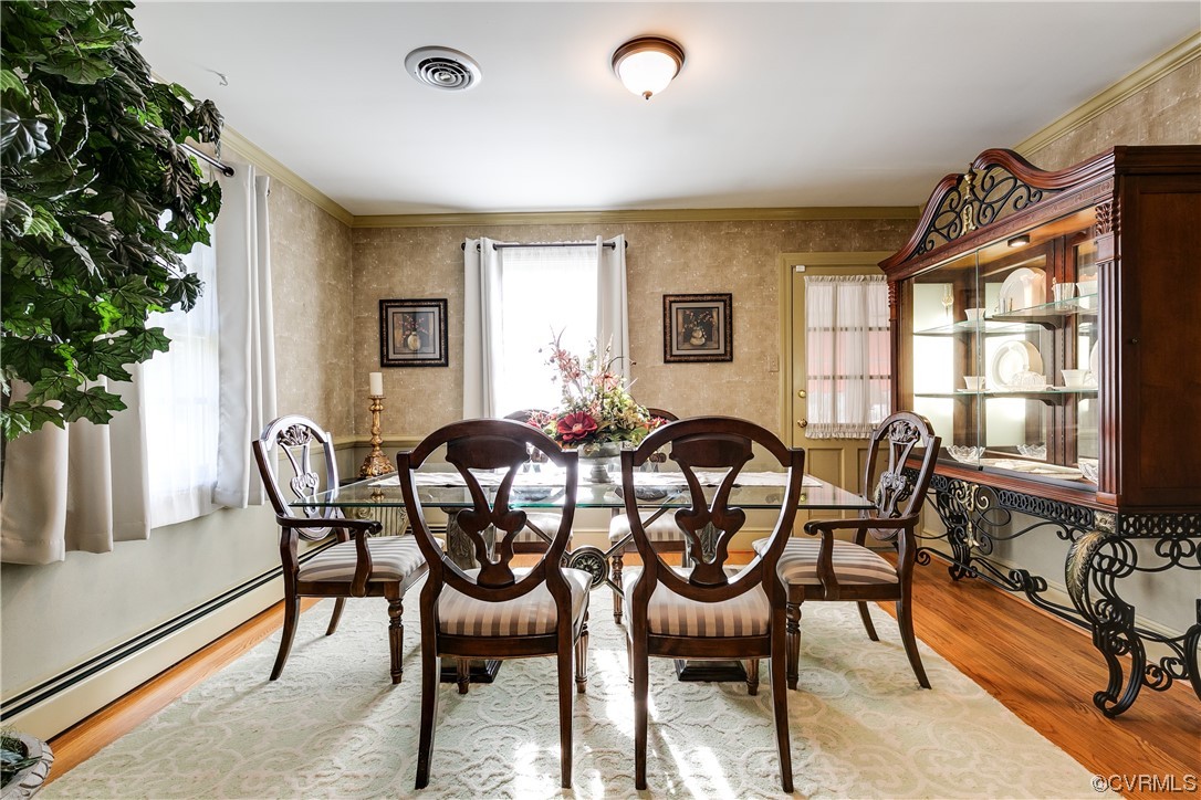 1430 Bloomfield Road Richmond, VA 23225 - Photo 8 of 47 a view of a dining room with furniture window and outside view