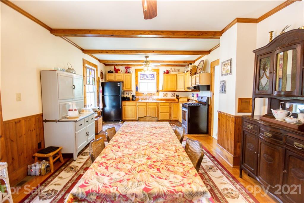 1870 Centenary Church Road Mount Ulla, NC 28125 - Photo 13 of 48 a kitchen with stainless steel appliances granite countertop a refrigerator and stove