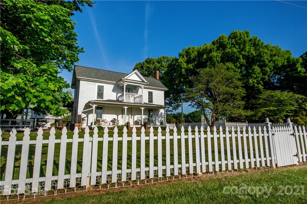 1870 Centenary Church Road Mount Ulla, NC 28125 - Photo 3 of 48 a front view of a house with a garden