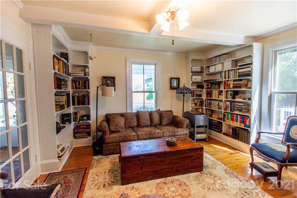 1870 Centenary Church Road Mount Ulla, NC 28125 - Photo 22 of 48 a living room with furniture and a book shelf