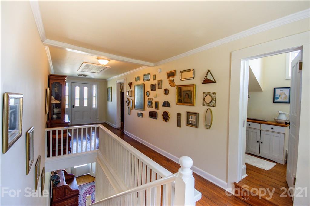 1870 Centenary Church Road Mount Ulla, NC 28125 - Photo 23 of 48 a view of a hallway with wooden floor and windows