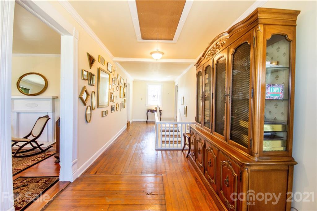 1870 Centenary Church Road Mount Ulla, NC 28125 - Photo 32 of 48 a view of a hallway with wooden floor and door