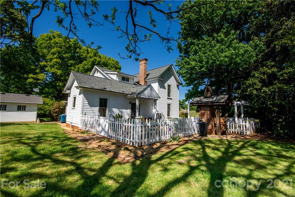 1870 Centenary Church Road Mount Ulla, NC 28125 - Photo 34 of 48 a front view of a house with a yard