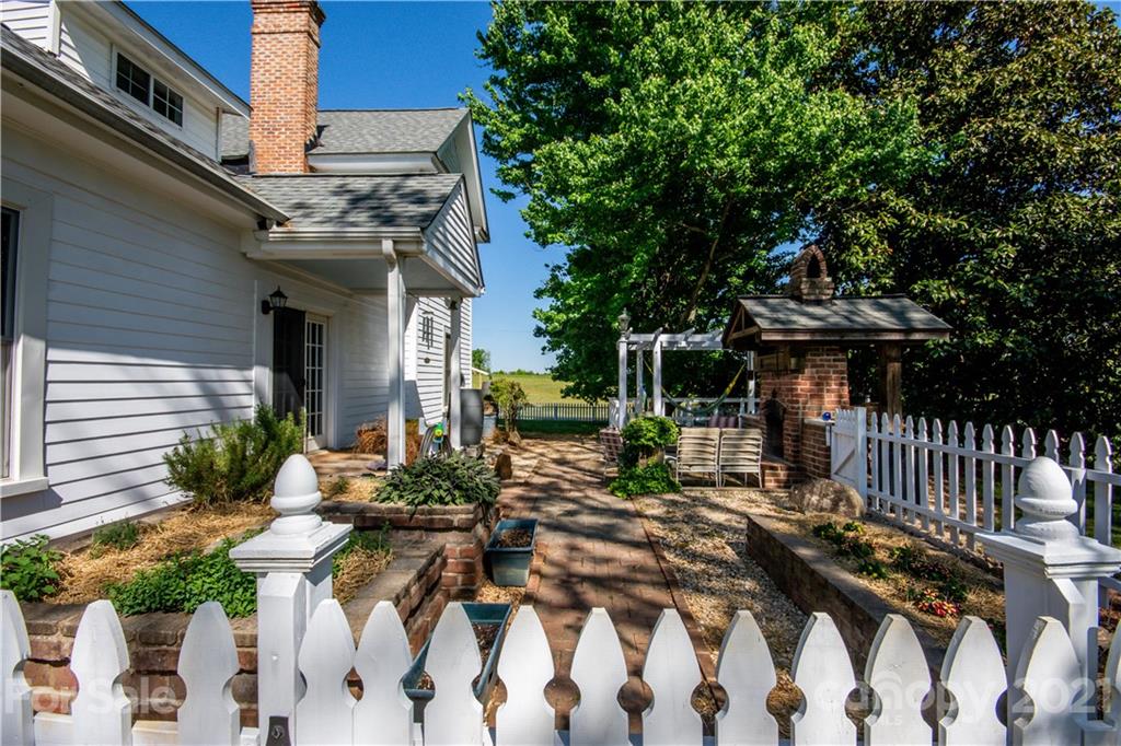 1870 Centenary Church Road Mount Ulla, NC 28125 - Photo 39 of 48 a front view of a house with garden