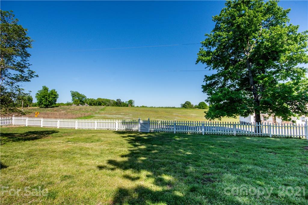 1870 Centenary Church Road Mount Ulla, NC 28125 - Photo 43 of 48 a view of a lake with a big yard
