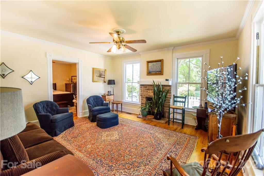 1870 Centenary Church Road Mount Ulla, NC 28125 - Photo 7 of 48 a living room with furniture or couch and a fireplace
