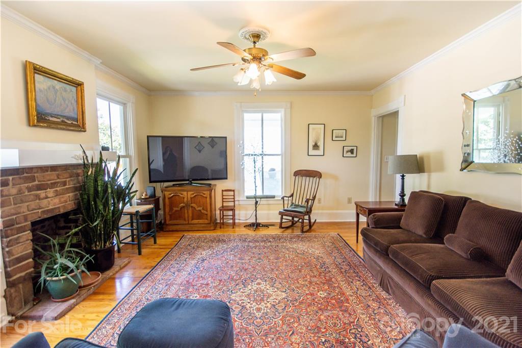1870 Centenary Church Road Mount Ulla, NC 28125 - Photo 8 of 48 a living room with furniture and a fireplace