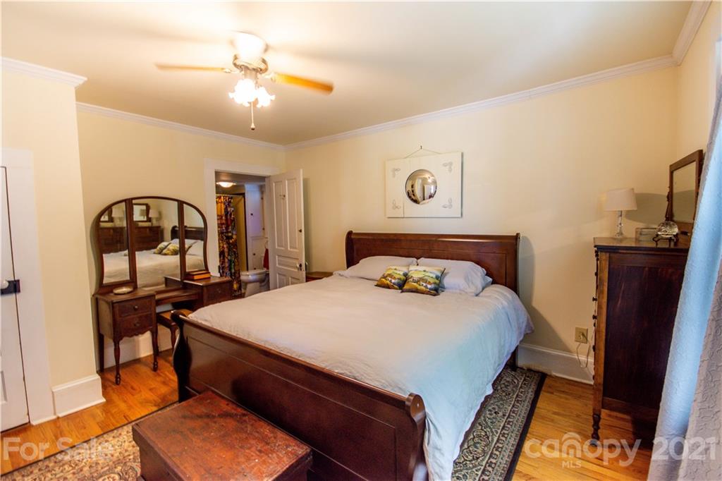 1870 Centenary Church Road Mount Ulla, NC 28125 - Photo 10 of 48 a bedroom with a bed a desk and chair