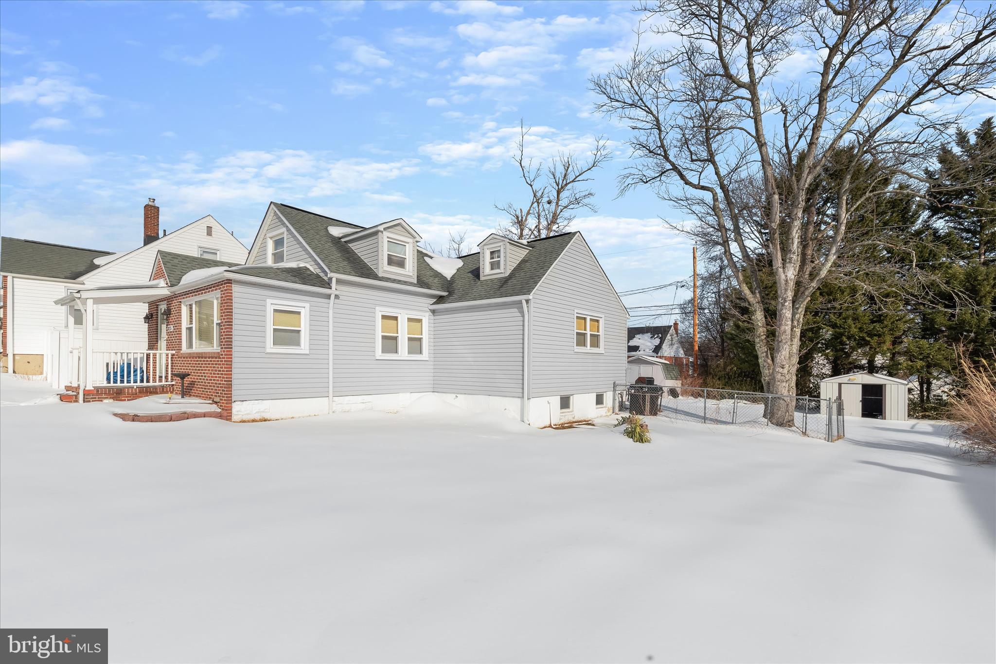 8215 Bon Air Road Baltimore, MD 21234 - Photo 12 of 19 a view of a house with snow on the road