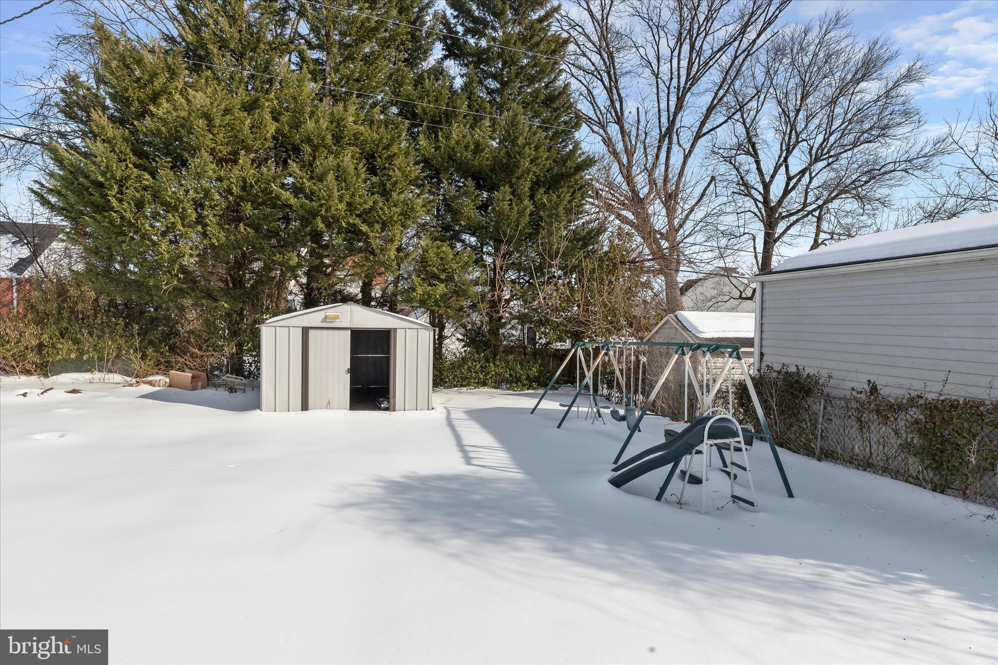8215 Bon Air Road Baltimore, MD 21234 - Photo 13 of 19 a house with trees in front of it