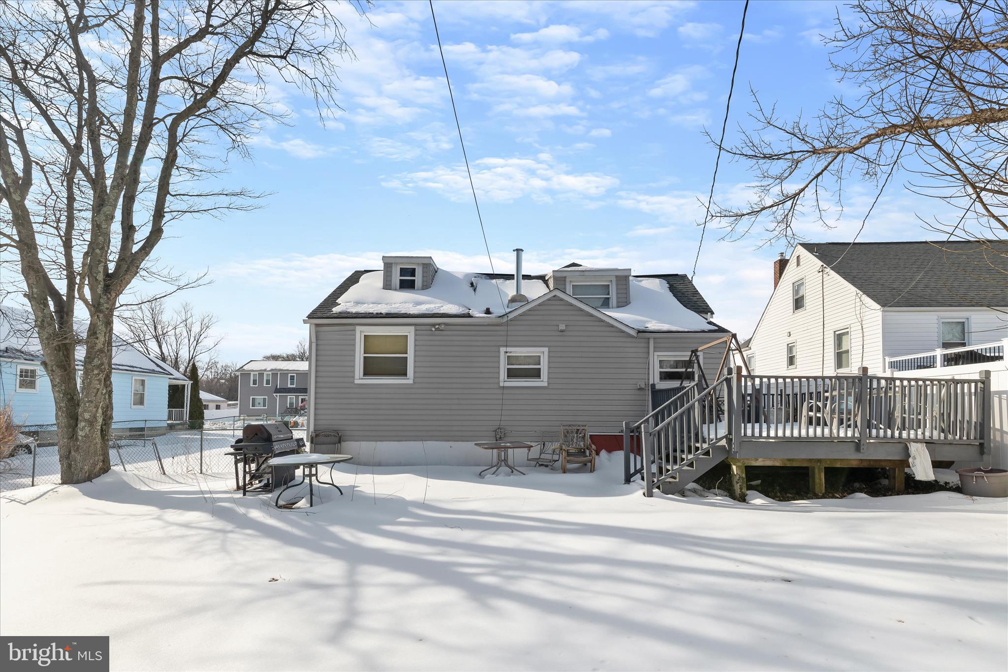 8215 Bon Air Road Baltimore, MD 21234 - Photo 14 of 19 a front view of a house with a yard
