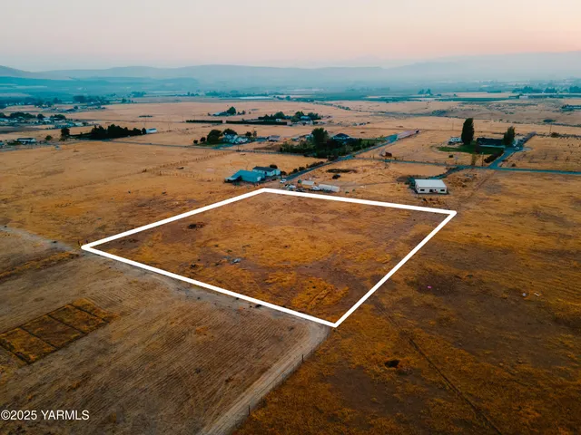 an outdoor space with lounge chair