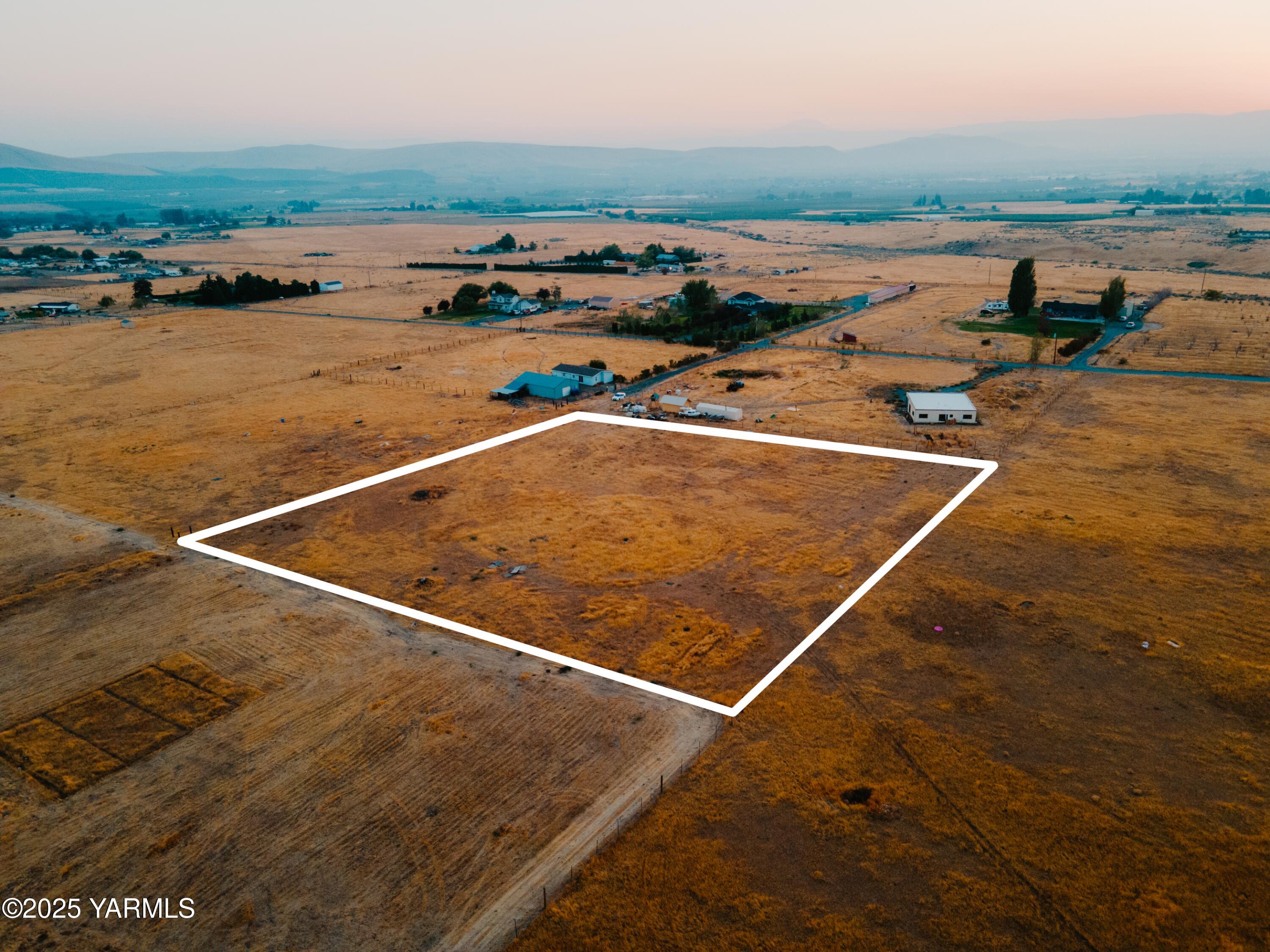 an outdoor space with lounge chair