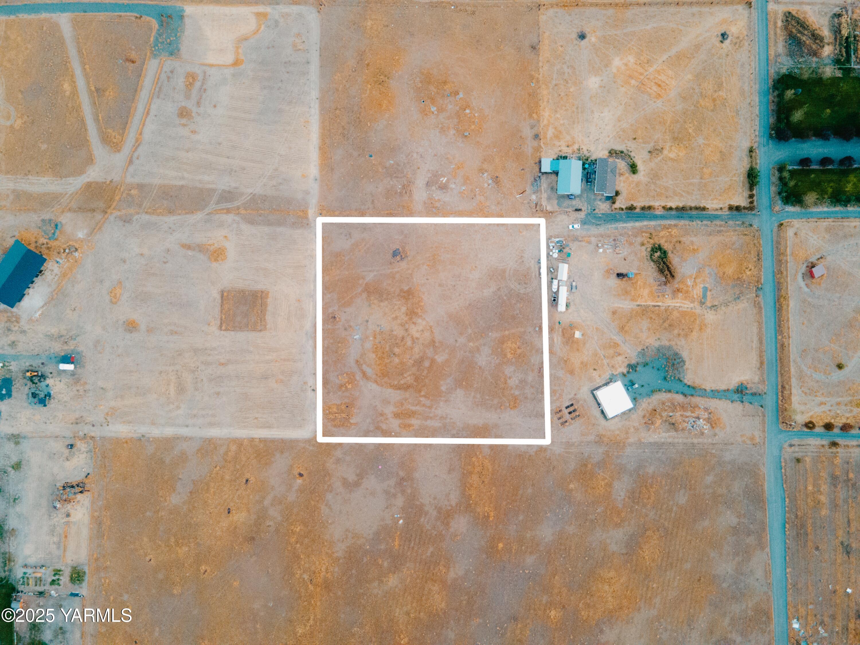 view of door with wooden floor