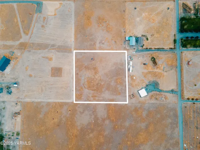 view of door with wooden floor