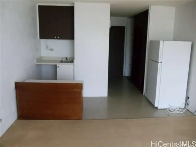 a view of a glass door with a roof deck