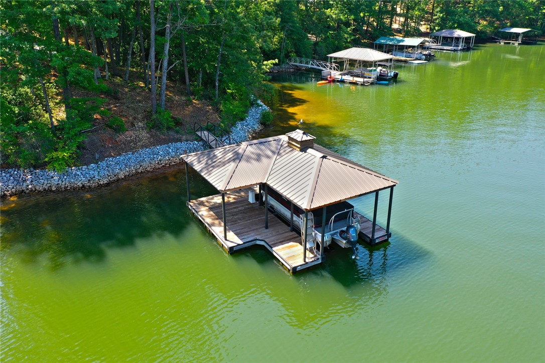 1359 Hbr Rdg Road Seneca, SC 29672 - Photo 7 of 39 A private boat dock provides direct access to the expansive lake.