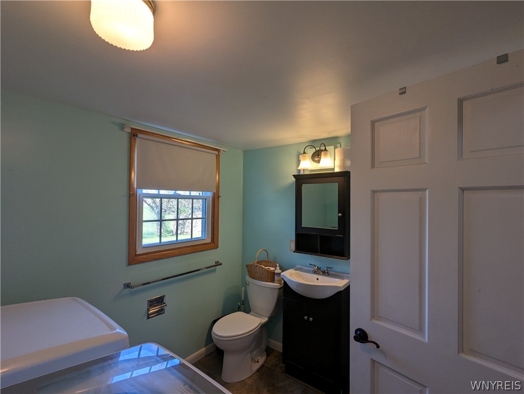 10 Liberty Street Perry, NY 14530 - Photo 39 of 50 Bathroom in basement with laundry