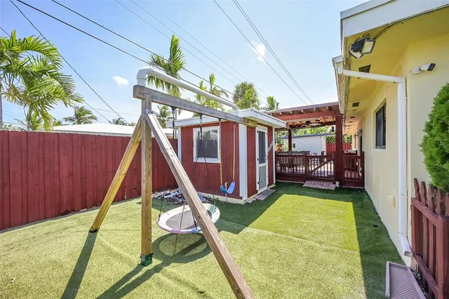 a view of swimming pool with a patio