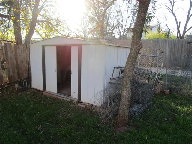a view of backyard with green space