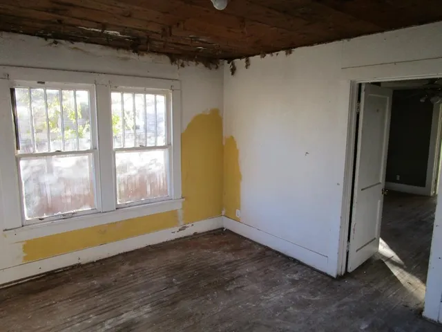 a view of a room that has a window in it