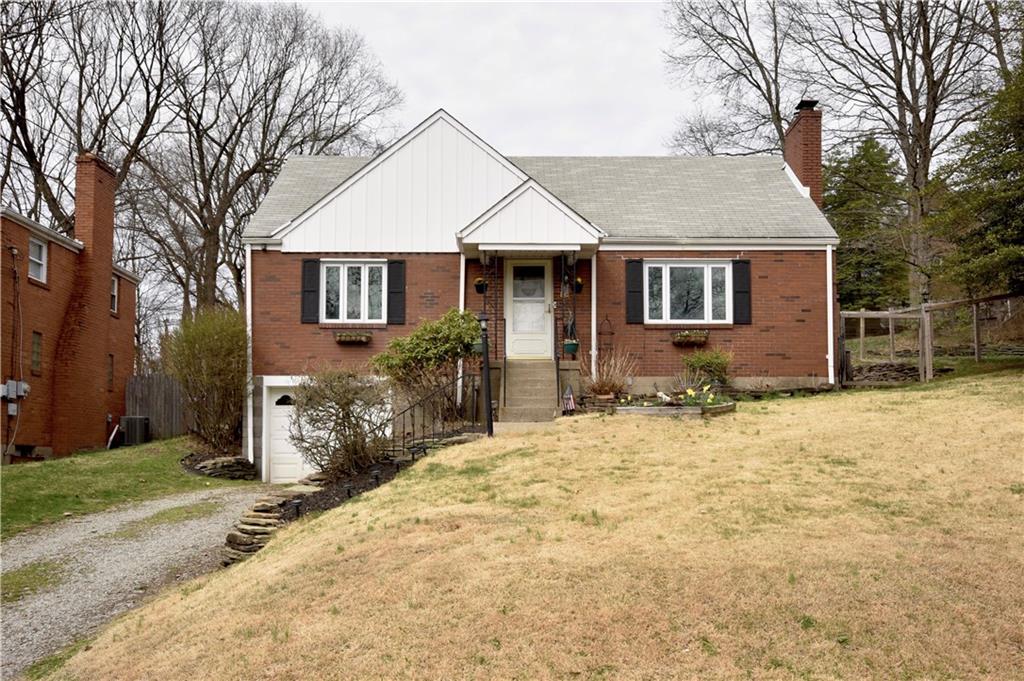 104 Earlwood Road Pittsburgh, PA 15235 - Photo 1 of 40 front view of a house with a yard