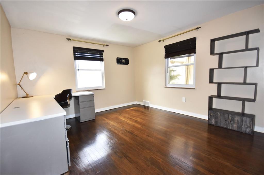 104 Earlwood Road Pittsburgh, PA 15235 - Photo 16 of 40 a living room with hard wood floors and a window