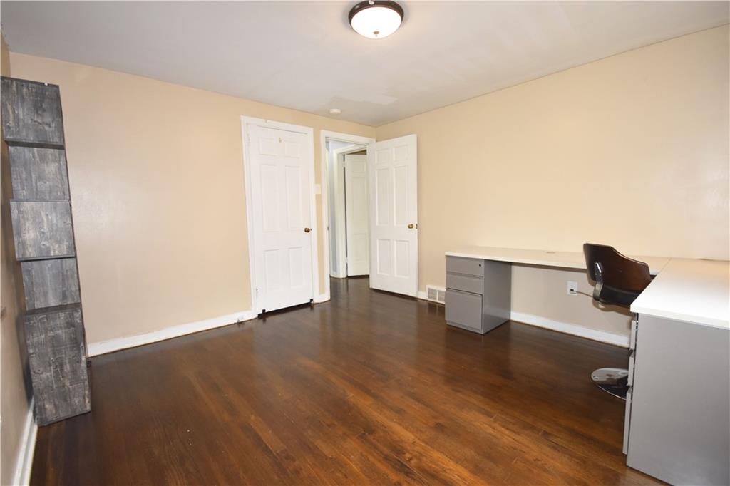 104 Earlwood Road Pittsburgh, PA 15235 - Photo 17 of 40 a view of empty room with wooden floor