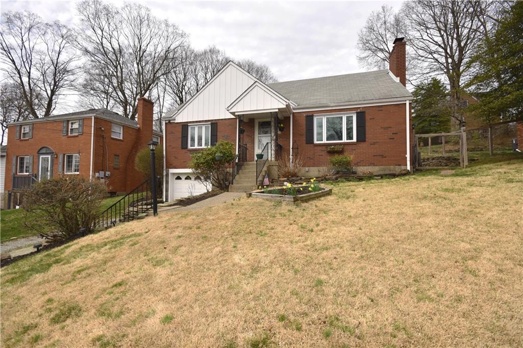 104 Earlwood Road Pittsburgh, PA 15235 - Photo 2 of 40 a front view of a house with yard