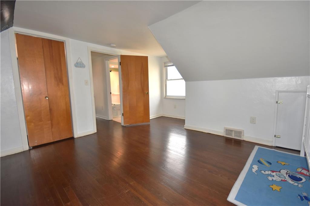 104 Earlwood Road Pittsburgh, PA 15235 - Photo 24 of 40 an empty room with wooden floor