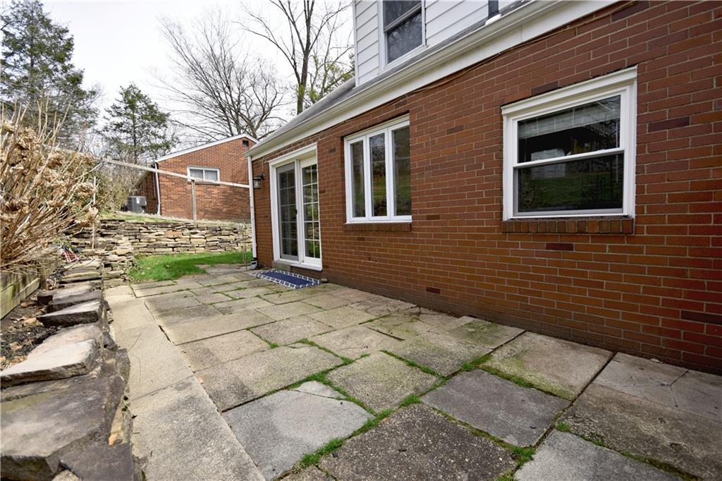 104 Earlwood Road Pittsburgh, PA 15235 - Photo 35 of 40 a brick house with a large windows