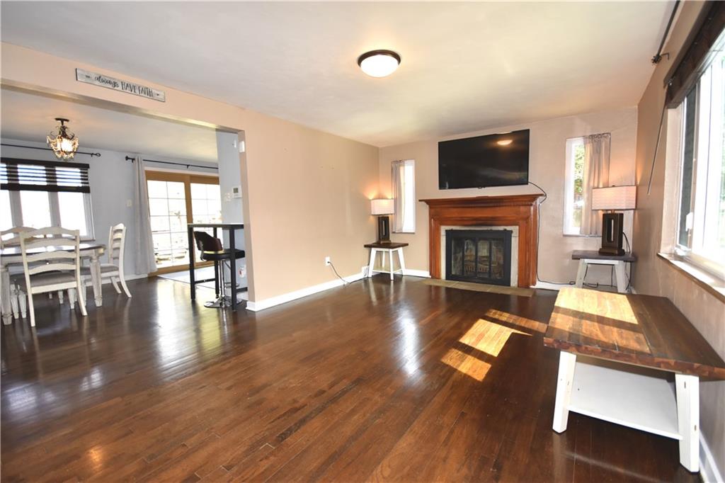 104 Earlwood Road Pittsburgh, PA 15235 - Photo 4 of 40 a living room with furniture fireplace and flat screen tv