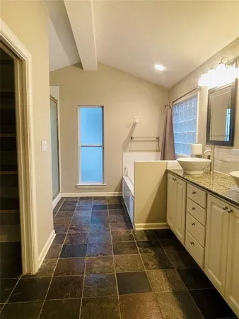 a utility room with cabinets