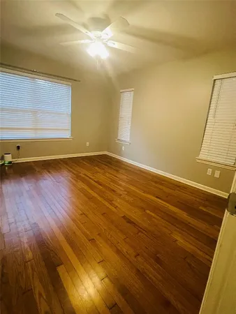 a view of room and wooden floor