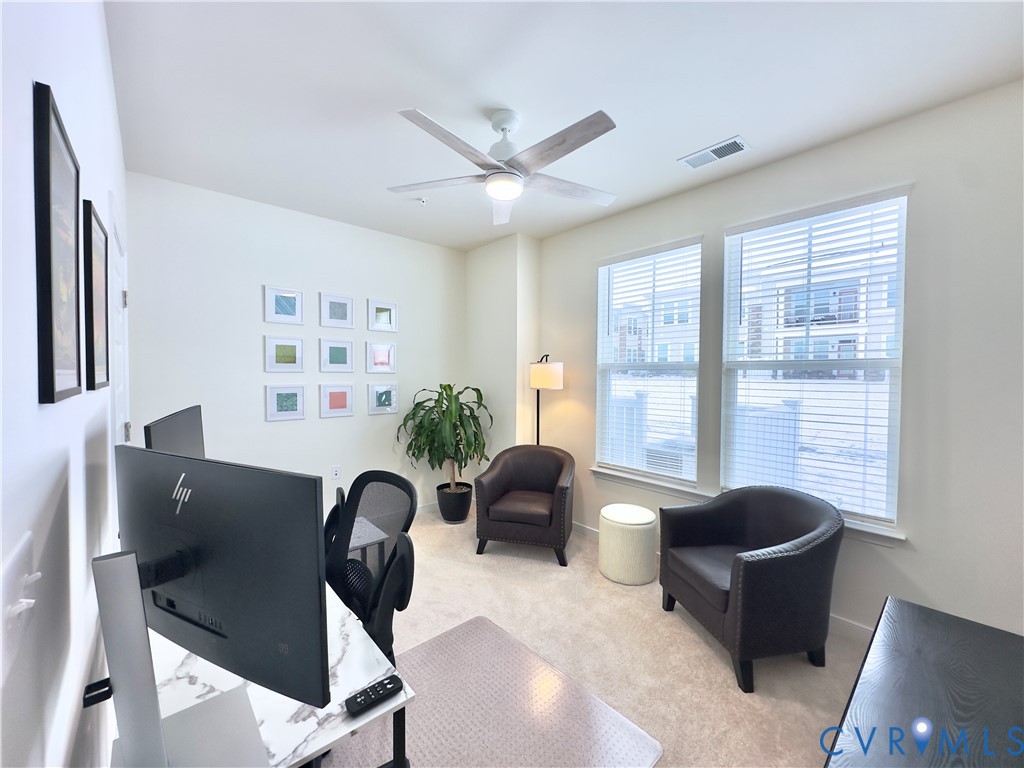 12423 Wescott Avenue Midlothian, VA 23112 - Photo 11 of 25 a living room with furniture and windows