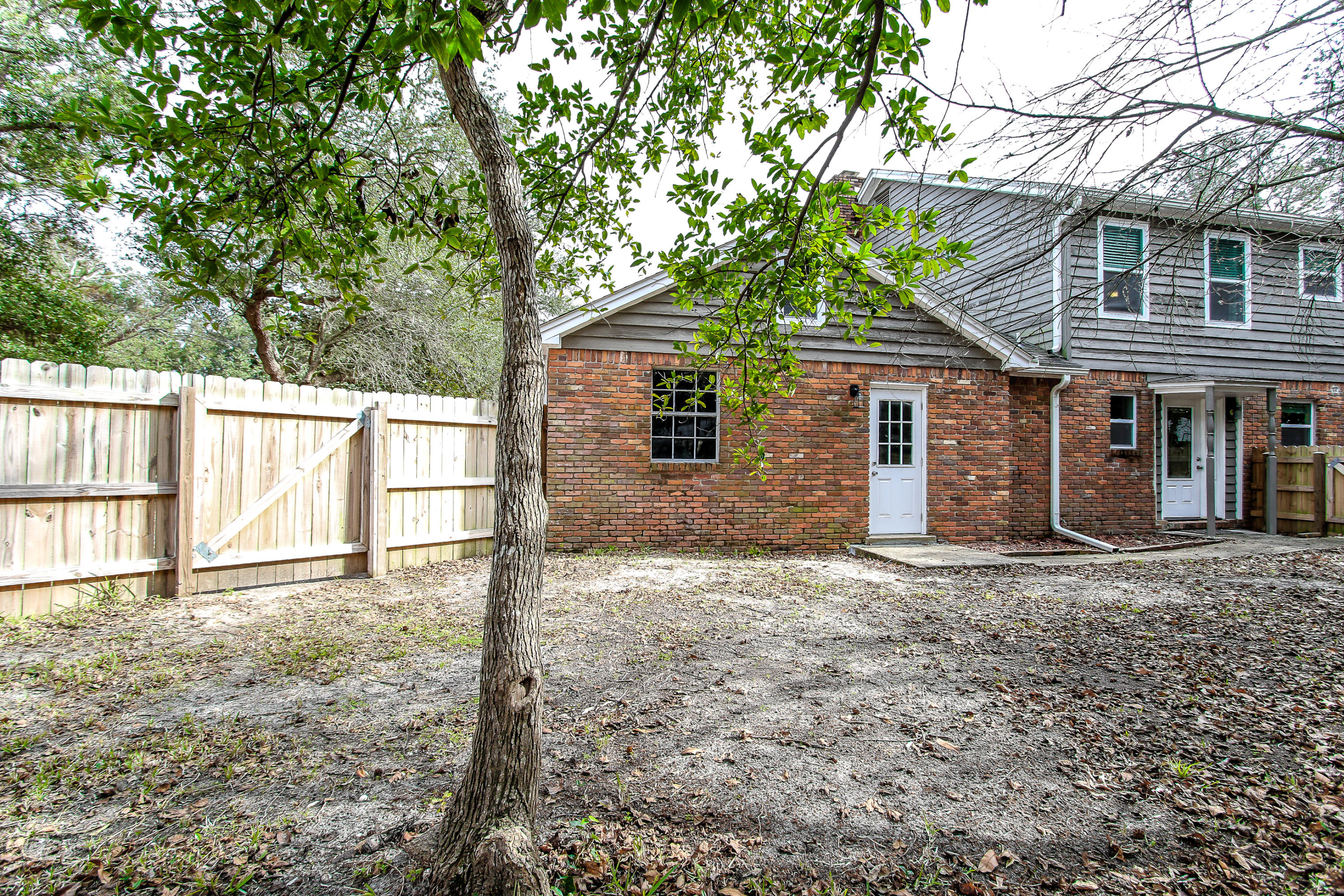 237 Country Club Road Shalimar, FL 32579 - Photo 18 of 74 front view of a house with a yard